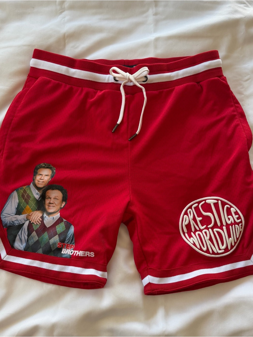 Red Men’s Athletic Shorts with White Trim and Prestige Worldwide Patch